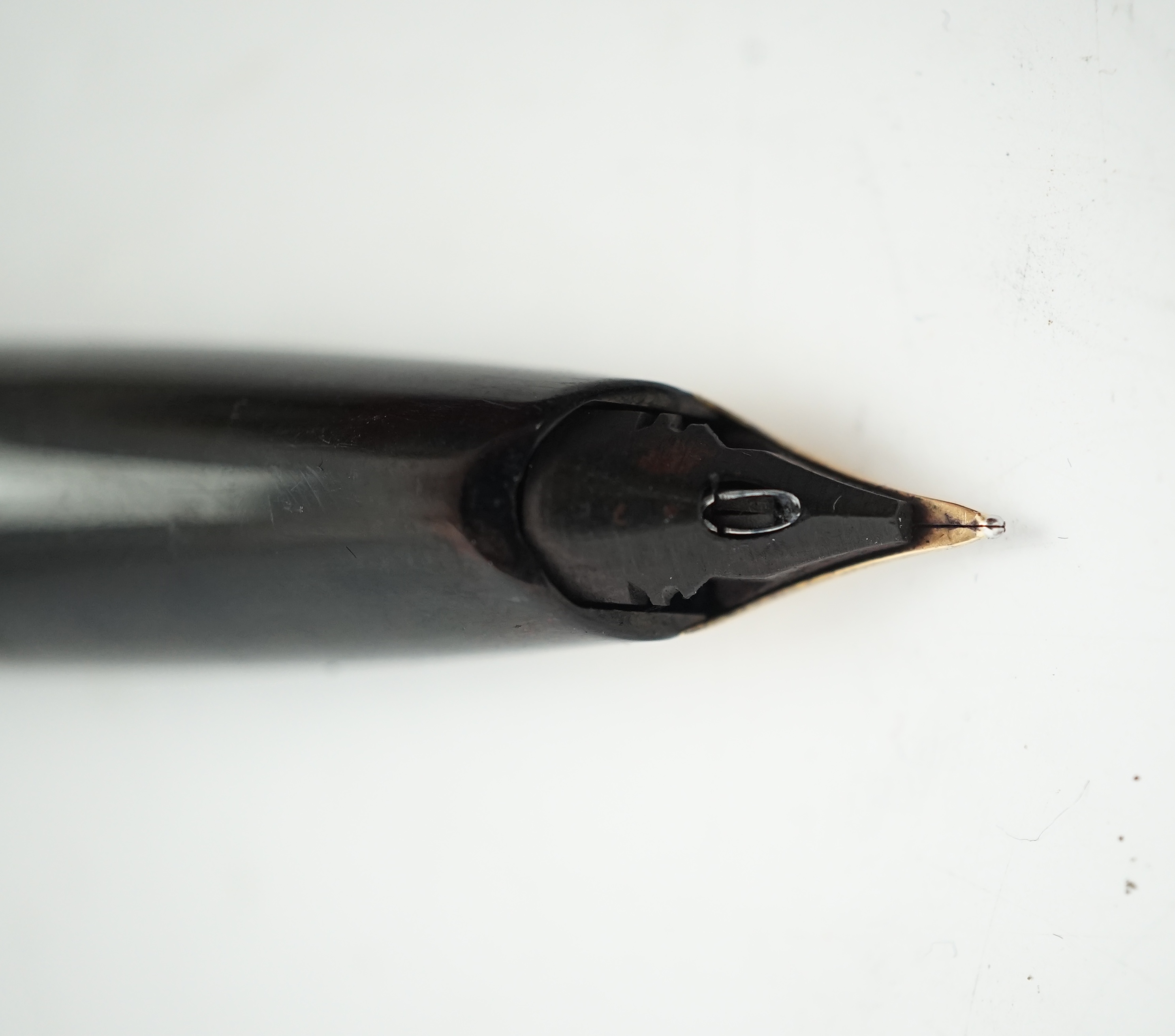 A Sheaffer 'PFM' fountain pen in black gold filled trim